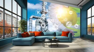 Double exposure of engineer holding walkie talkie are working orders the oil and gas refinery plant. Industry petrochemical concept image and icon connecting networking using technology. Wall mural