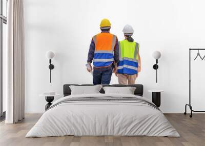 Female engineer and foreman worker checking project at building site, Engineer and builders in hardhats discussing on construction site, Teamwork concepts Wall mural