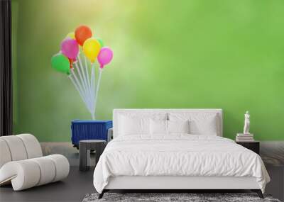 air balloons and truck toy on wood background. truck, Concept for visualization of delivery services, logistics, business, forwarding, travel, cargo delivery. banner, copy space Wall mural