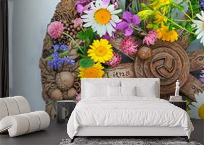 Altar for Summer solstice, Litha wiccan holiday. wheel of the year with colorful flowers close up on abstract marble background. symbol of celtic wiccan summer sabbat. Wall mural