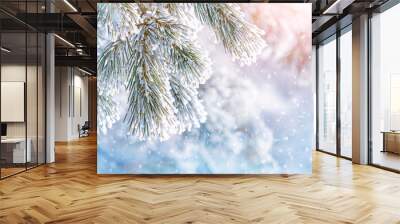 snowy pine tree branches close up, beautiful natural background. Frozen tree branch in winter forest, cold weather. Christmas, new year holidays concept. festive winter season Wall mural