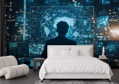 Man analyzing global data on large digital screens in futuristic setting Wall mural