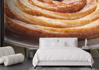 Vertical shot of wheel churros n a plate Wall mural