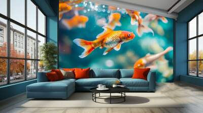 Vibrant goldfish swimming in a colorful aquarium Wall mural