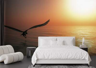 Eagle flying flush with water Wall mural