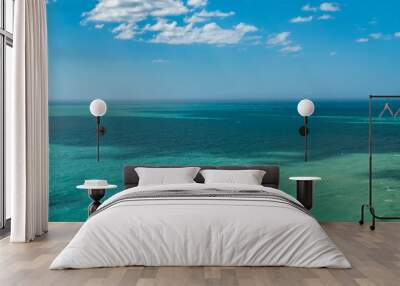 colombian blue open ocean with clouds Wall mural