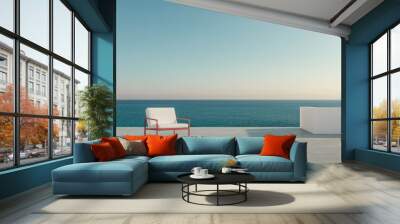 A minimalist outdoor lounge chair facing the ocean at sunset in a serene coastal setting Wall mural