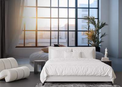 Cozy seating area with cushions in front of large window at sunset in a modern apartment Wall mural