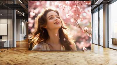 Peaceful young woman next to a sakura tree. Generative AI. Wall mural