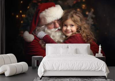 Cute little girl hugging Santa Claus Wall mural