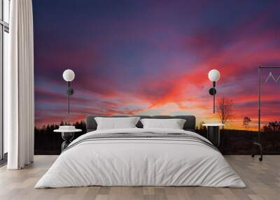 Beautiful vibrant sunset clouds view landscape Wall mural