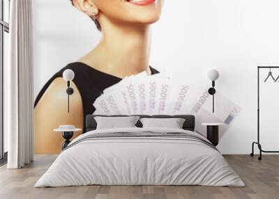 Young happy woman with dollars in hand. Isolated on white backgr Wall mural