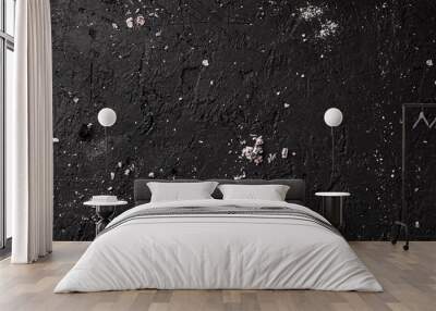 Black stone background with coals and ashes, grey cement texture. Top view, flat lay Wall mural