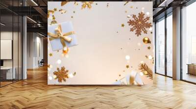 Merry Christmas and New Year background. Xmas holiday card made of flying decorations, gold fir branches, balls, snowflakes, sparkles, gift boxes, bokeh, light on golden background. Selective focus Wall mural