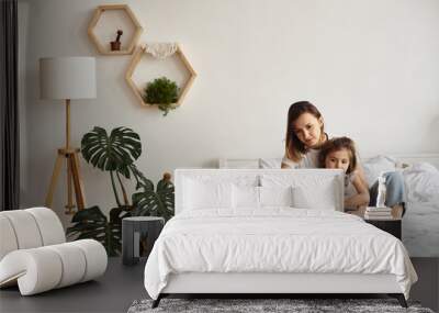 daughter watching mom work on computer Wall mural