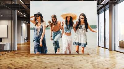 four beautiful girls on the beach Wall mural