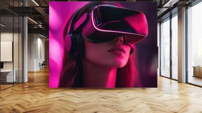 A young woman explores a virtual reality world while wearing a headset in a neon-lit urban environment at night Wall mural