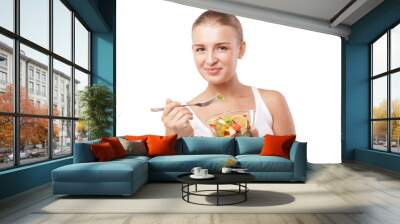 Pretty girl eating fruit salad isolated Wall mural