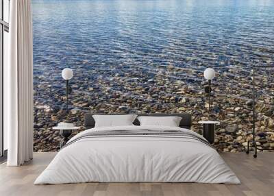 beach of rocks with clear water Wall mural