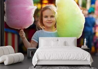 girl holding cotton candy Wall mural