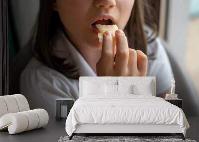 Child Eating Cheese: Close-Up Wall mural