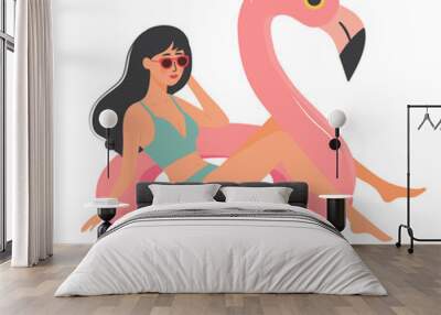 Beautiful girl in swimsuit sitting on pink flamingo inflatable ring. Woman relaxing and sunbathing. Summer vacation, holiday, travel, leisure. Wall mural