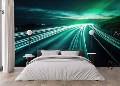 Green traffic light on the road, a concept of road transport using renewable energy sources for environmentally friendly cars at night Wall mural