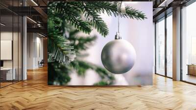 Christmas tree branch decorated with silver balls and white decor Wall mural