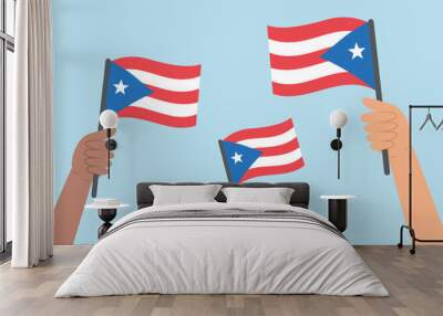 Diverse people hands raising flags of Puerto Rico. Vector illustration of Puerto Rico flags in flat style on blue background. Wall mural