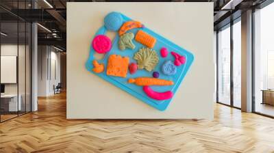 Plasticine fruits on a blue background Wall mural