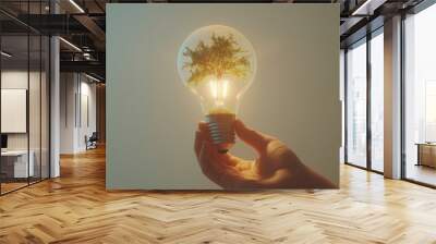 sustainable environment and nature protection. hand holding lightbulb with growing tree inside in clean environment. creative idea for sustainable development goal in renewable energy. 3D vector. Wall mural