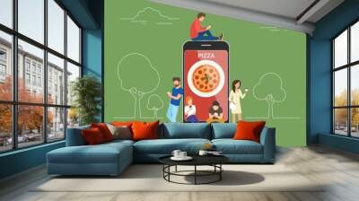 Ordering pizza online concept design. Flat illustration of young men and women standing near big smartphone and using their own smart phones for ordering junk food via mobile app and paying online. Wall mural