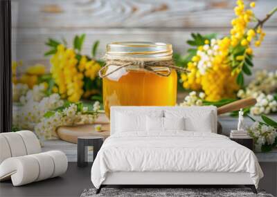 a jar of organic honey on the table against a background of blooming flowers, natural product, bowl, sweet, yellow, golden, apiary, farm, honey farming, beekeeping, delicious food Wall mural