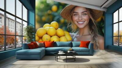 beautiful smiling young italian woman holding basket full of lemons against lemon garden background, harvest, citrus, fresh fruit, girl, nature, gardening, female portrait, summer, autumn, vitamin C Wall mural