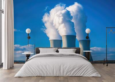 nuclear power plant against blue sky, reactor, cooling tower, atomic energy, steam from pipes, industrial architecture, smoke, ecology, environment, electricity generation, electric Wall mural