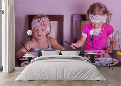 Funny little girls (sisters) are drawn. Wall mural