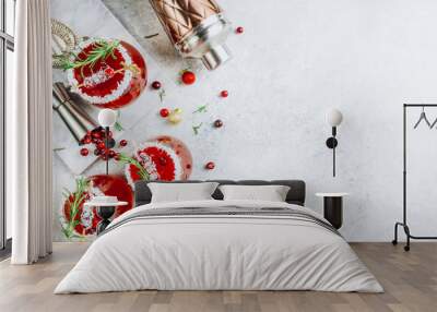 Festive Cranberry drink on Christmas background Wall mural