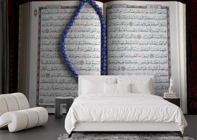 Open Kuran and prayer beads. Wall mural