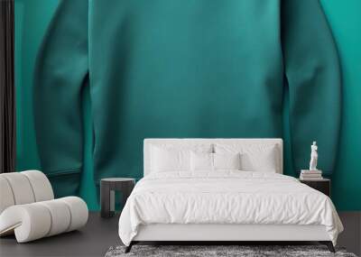 Teal blank sweater without folds flat lay isolated on gray modern seamless background Wall mural