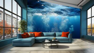 Underwater view with bubbles rising to the surface in a deep blue ocean. The image captures the serenity and mystery of the underwater world Wall mural