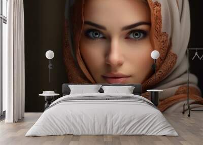 Close-up of a beautiful woman with striking eyes wearing a stylish hijab Wall mural