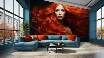 Portrait of a woman with vibrant red hair flowing dramatically on a dark background Wall mural