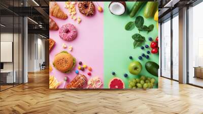 Healthy and unhealthy food background from fruits and vegetables vs fast food, sweets and pastry top view. Diet and detox against calorie and overweight lifestyle concept. Wall mural