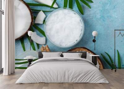 Set of organic coconut products for spa, cosmetic or food ingredients. Oil, water and shavings top view. Flat lay. Wall mural