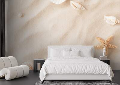 Top view of a sandy beach with exotic seashells and starfish as natural textured background for aesthetic summer design Wall mural