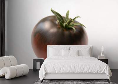 A perfectly colored Cherokee Red Tomato on a white background.  Wall mural