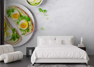 Avocado Egg Toast, Healthy Snack or Breakfast on Bright Background Wall mural