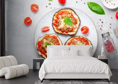 Eggplant Pizza with Tomato Sauce, Minced Meat, Mozzarella and Basil, Mini Vegetable Pizza over Bright Background Wall mural