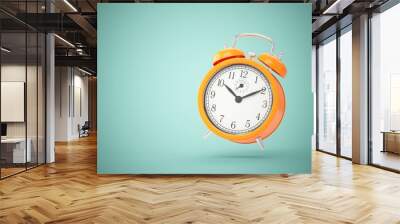 3D rendering orange alarm clock isolated on green background Wall mural