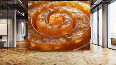 kaleidoscopic pattern of brown lollipops swirling spiral arrangement candy texture closeup warm caramel tones Wall mural